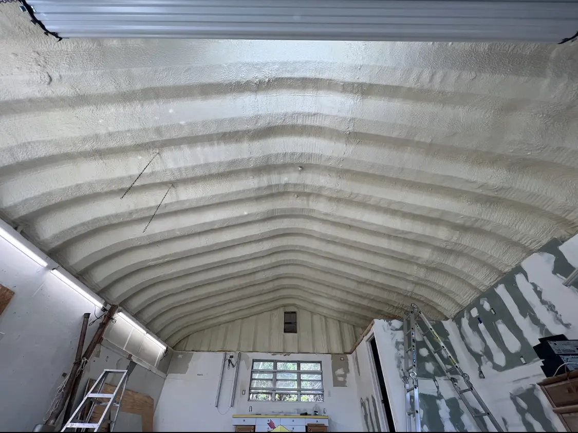 Spray polyurethane foam applied to the underside of a metal roof deck in Gilbert